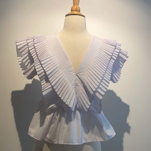 PLEATED RUFFLE BUTTONED DEEP V-NECK CROP TOP